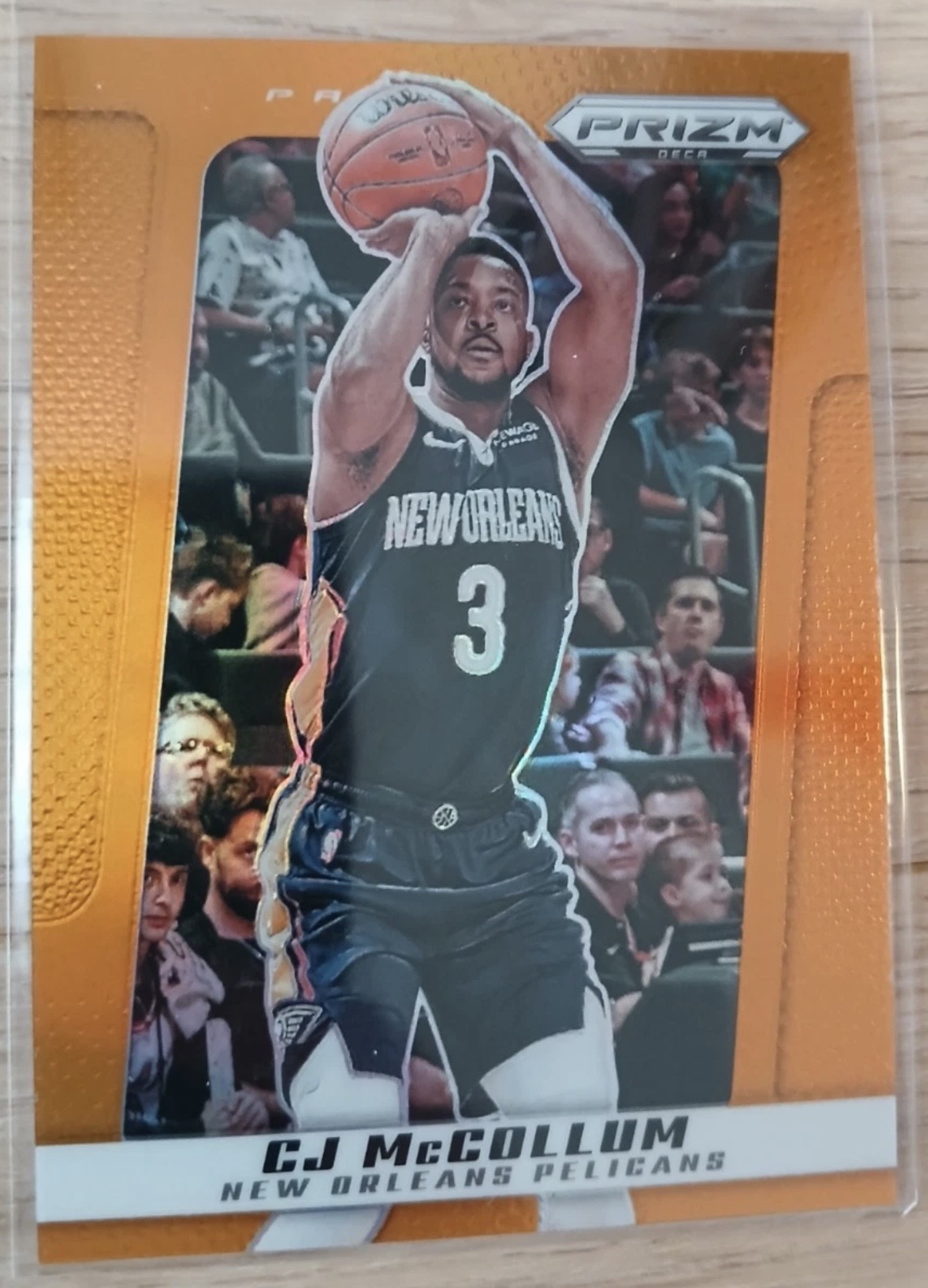 2024-25 Panini Prizm Deca — Base — CJ McCollum #137 — Orange Prizm /49 實物相